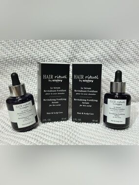 Sisley Revitalizing Fortifying Serum 60ml $150 each.
